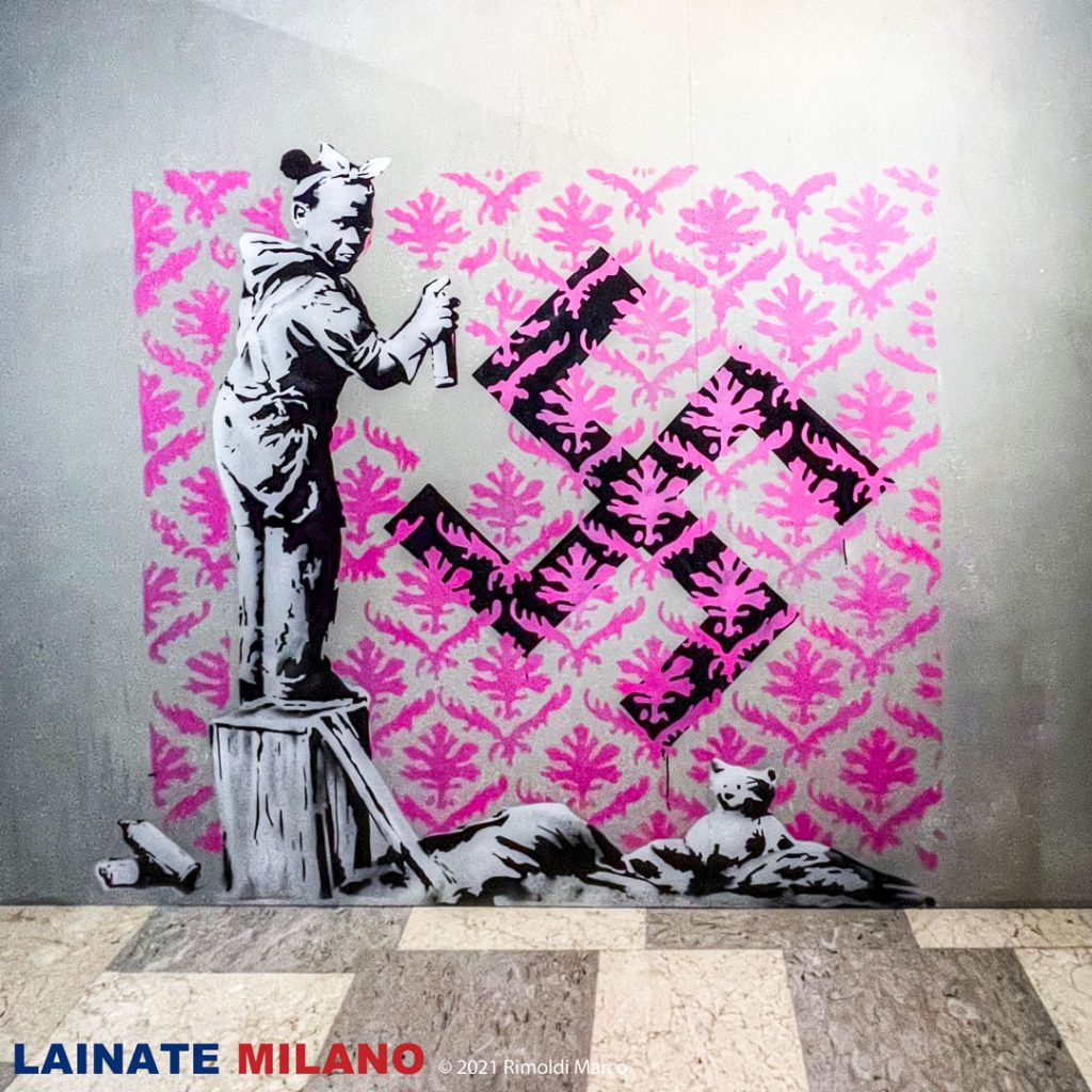 THE WORLD OF BANKSY -  Little Gir Covering a Swastika